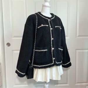 Furry jacket with twisted rope trim and gold buttons